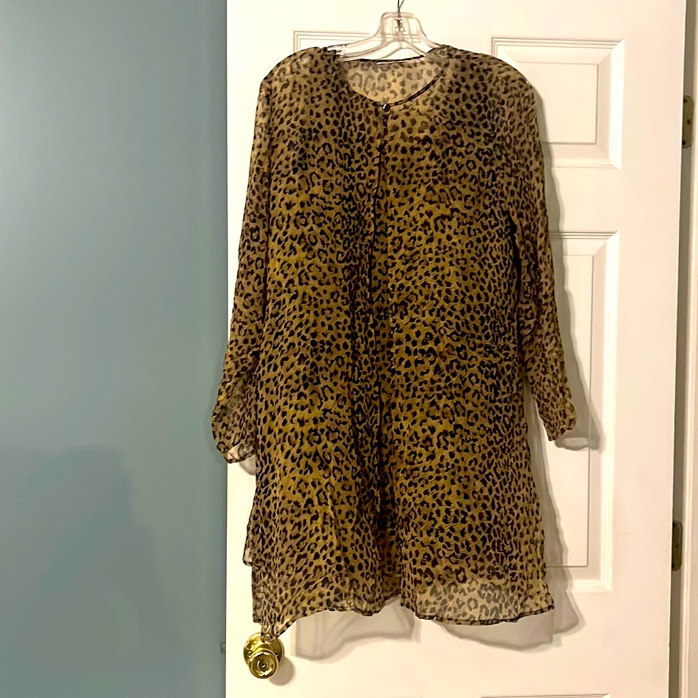 Great dress! Comfortable and versatile. Animal print sheer!